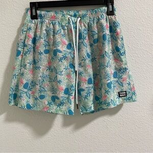 Men’s tropical print swim trunks